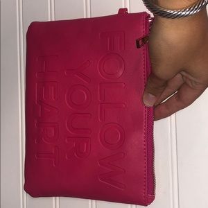 “follow your heart” clutch